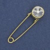 دبوس بروش كريستال أبيض 38×10 mm ± معدن ذهبي اللون